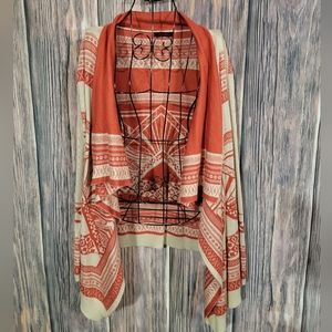 Beautiful cream and orange sweater.